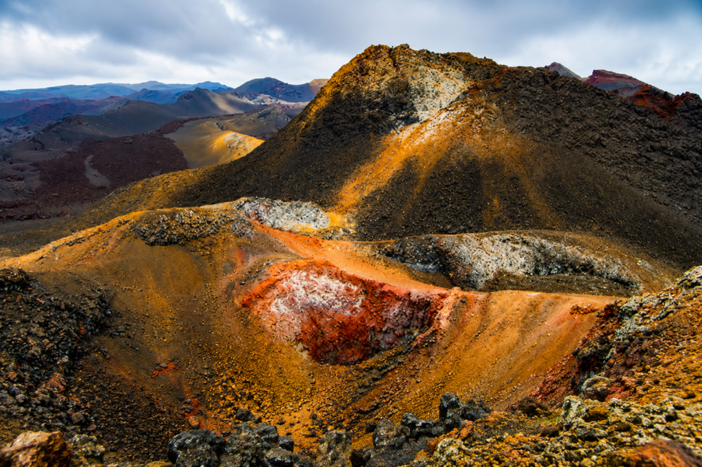 Galápagos volcanic crater landscape with colorful mineral-rich lava formations
