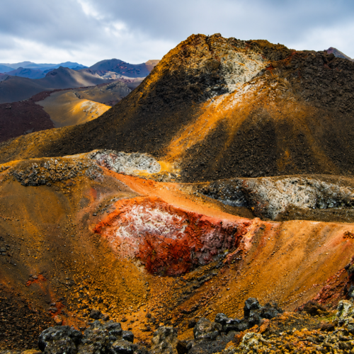 Galápagos volcanic crater landscape with colorful mineral-rich lava formations