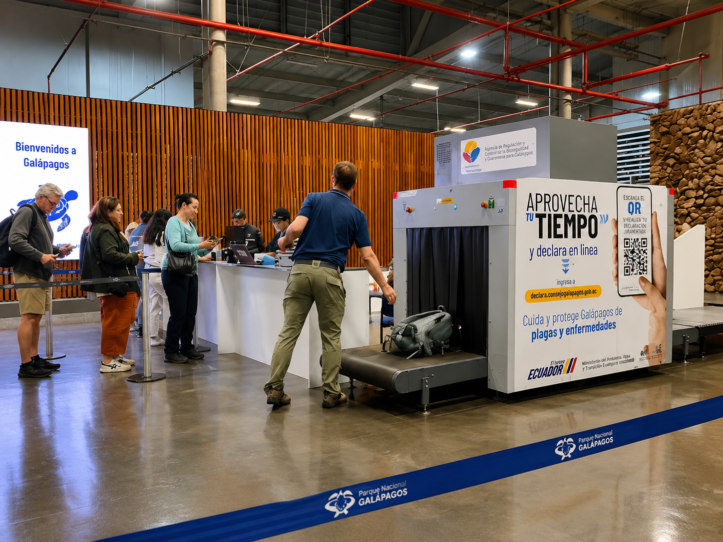 Galápagos airport biosecurity checkpoint where travelers have their luggage inspected before entering the islands.
