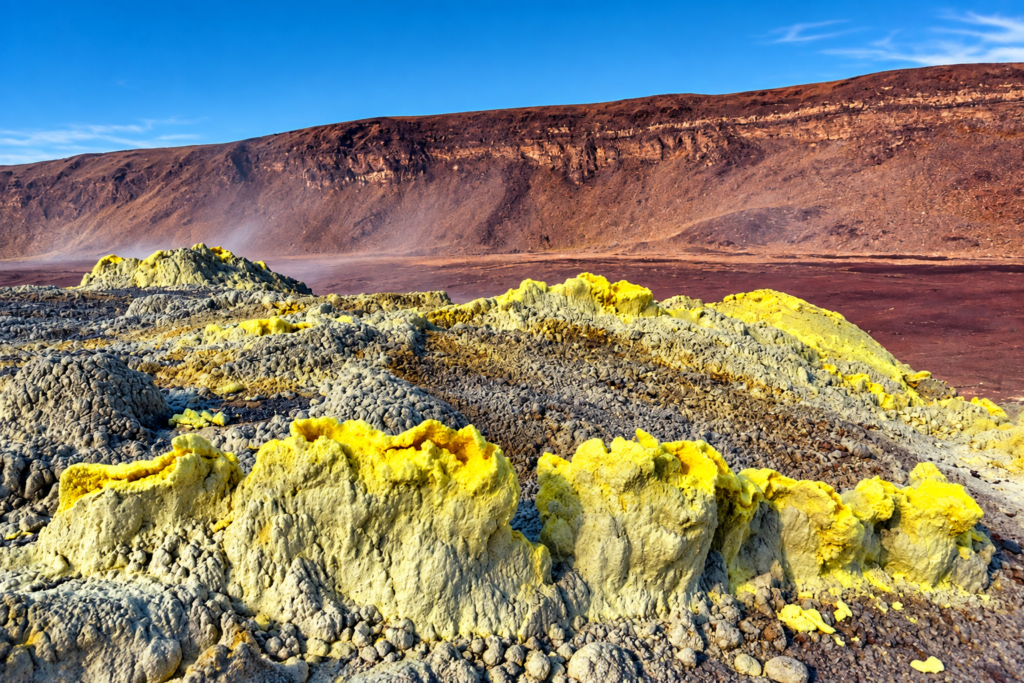 Yellow sulfur deposits and volcanic formations at Sierra Negra Volcano on Isabela Island, Galápagos