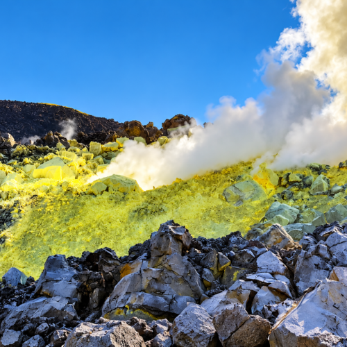 Sulfur fumaroles and volcanic rocks at Sierra Negra Volcano in the Galápagos Islands