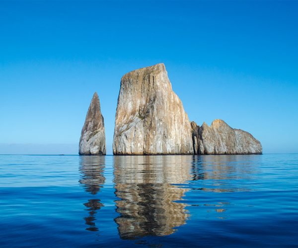Kicker Rock rising from the blue waters of the Galápagos near San Cristóbal Island